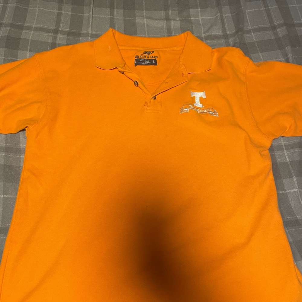 university of tennessee polo shirt in a size L